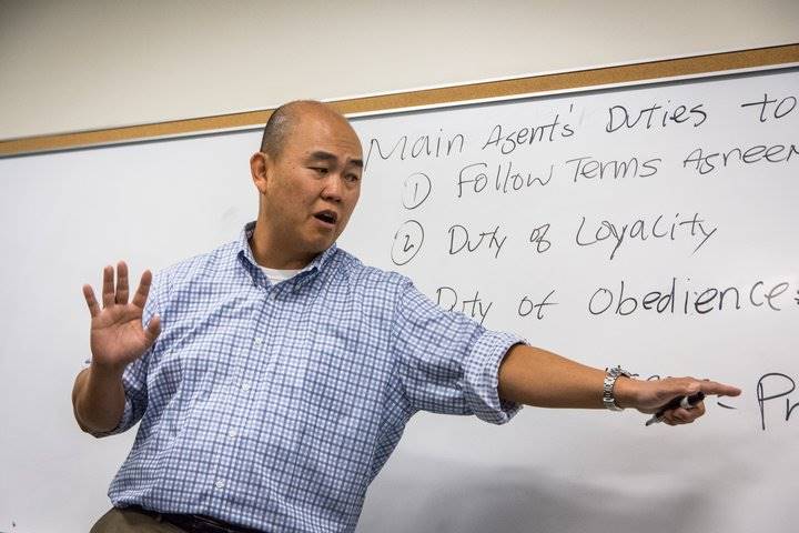 Professor Abel Chen teaches a legal studies course.