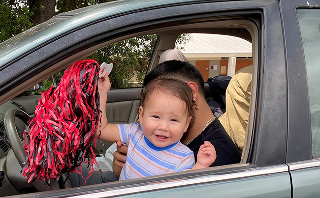 A kid celebrating the class of 2022
