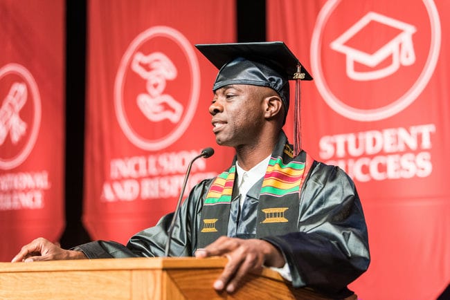 Grad student at the podium