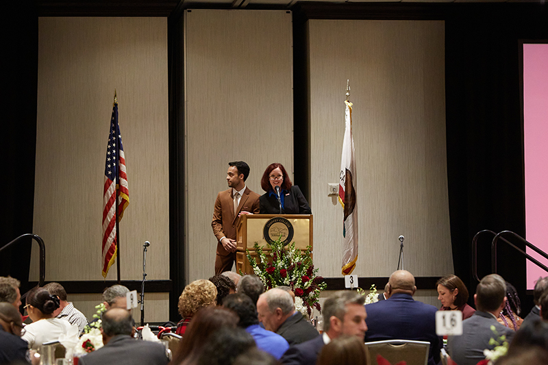 Interim Director of Foundation, Community Partnerships and External Relations, Heather Parsons speaking at the podium.