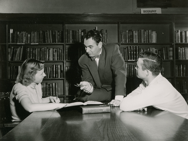 1955 two students and a staff member in Ontario Campus Library