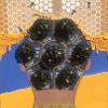 Marteena Taylor, “Bee a Bantu Baddie,” 2022. Acrylic, hot glue, synthetic hair, hair jewelry, and beads. 24 x 18 inches. Facebook @pristeencolouredartistry