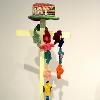 Mackenzie Bussola, “Sweater Scarf & ‘Art’ Hat,” 2023. Acrylic yarn scraps. 3 x 60 inches, 4 x 13.5 x 31 inches.