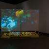 Lindsay Buchman, Stratagems (Orange County), 2021-25. Installation with HD video & Super 8, diegetic sound, projection on scrim & plywood, archival inkjet prints & silver gelatin prints. Courtesy of the artist. Photography by Cindy Dillingham. 