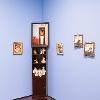 Alexis Bautista, Ni de aquí, ni de allá, 2026. Installation with archival pigment prints and found objects. Dimensions variable. Student Invitational 2026. April 27- May 14, 2026. Wignall Museum of Contemporary Art, Rancho Cucamonga, CA. Photography by Cindy Dillingham. 