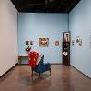 Alexis Bautista, Ni de aquí, ni de allá, 2026. Installation with archival pigment prints and found objects. Dimensions variable. Student Invitational 2026. April 27- May 14, 2026. Wignall Museum of Contemporary Art, Rancho Cucamonga, CA. Photography by Cindy Dillingham. 