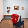 Alexis Bautista, Ni de aquí, ni de allá, 2026. Installation with archival pigment prints and found objects. Dimensions variable. Student Invitational 2026. April 27- May 14, 2026. Wignall Museum of Contemporary Art, Rancho Cucamonga, CA. Photography by Cindy Dillingham. 