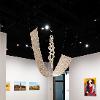 (foreground) Enrique Tapia, It’s Just Paper, 2026. Recycled book paper. 6 feet (longest dimension). Student Invitational 2026, April 27- May 14, 2026. Wignall Museum of Contemporary Art, Rancho Cucamonga, CA. Photography by Cindy Dillingham.