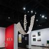 (foreground) Enrique Tapia, It’s Just Paper, 2026. Recycled book paper. 6 feet (longest dimension). Student Invitational 2026, April 27- May 14, 2026. Wignall Museum of Contemporary Art, Rancho Cucamonga, CA. Photography by Cindy Dillingham.