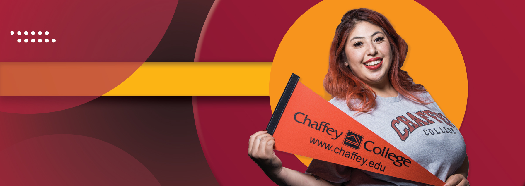 Student holding Chaffey pennant