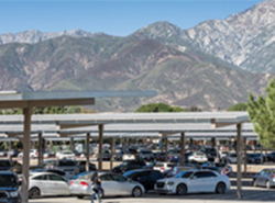 Vehicles parked under solar panels structure