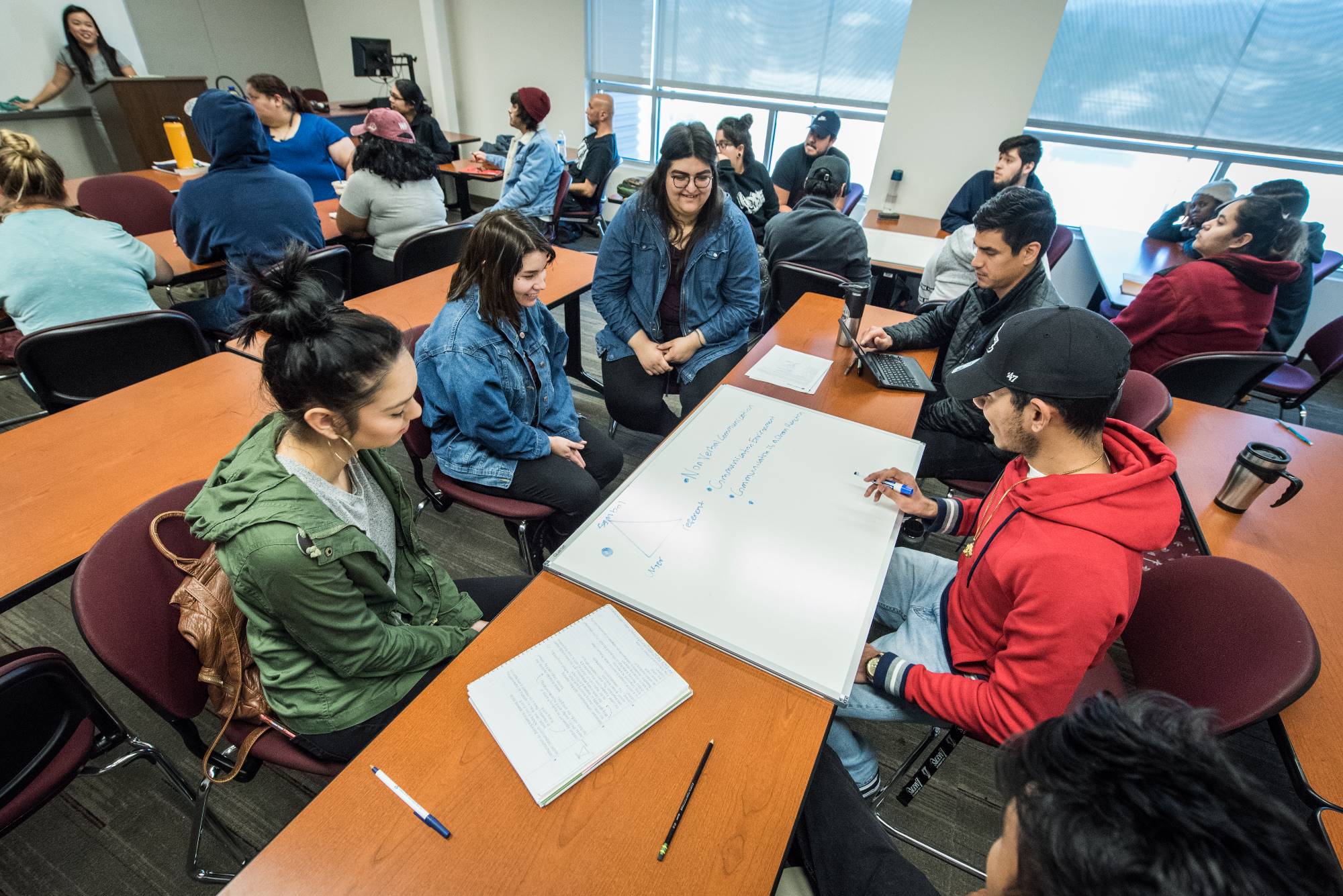 Students in a communication studies class at the Chaffey College Fontana campus work in groups.