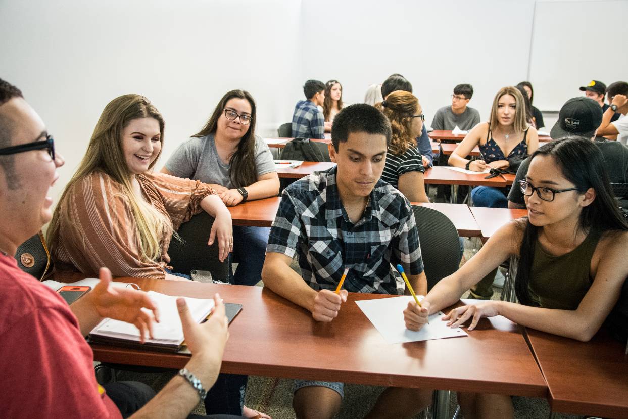 Students work in groups in an English class.