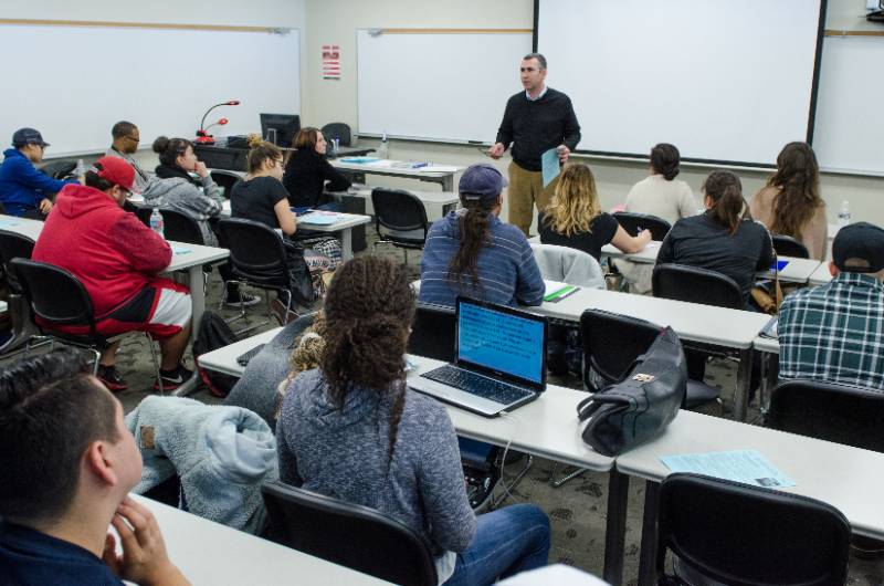 students in a busineess class with instructor