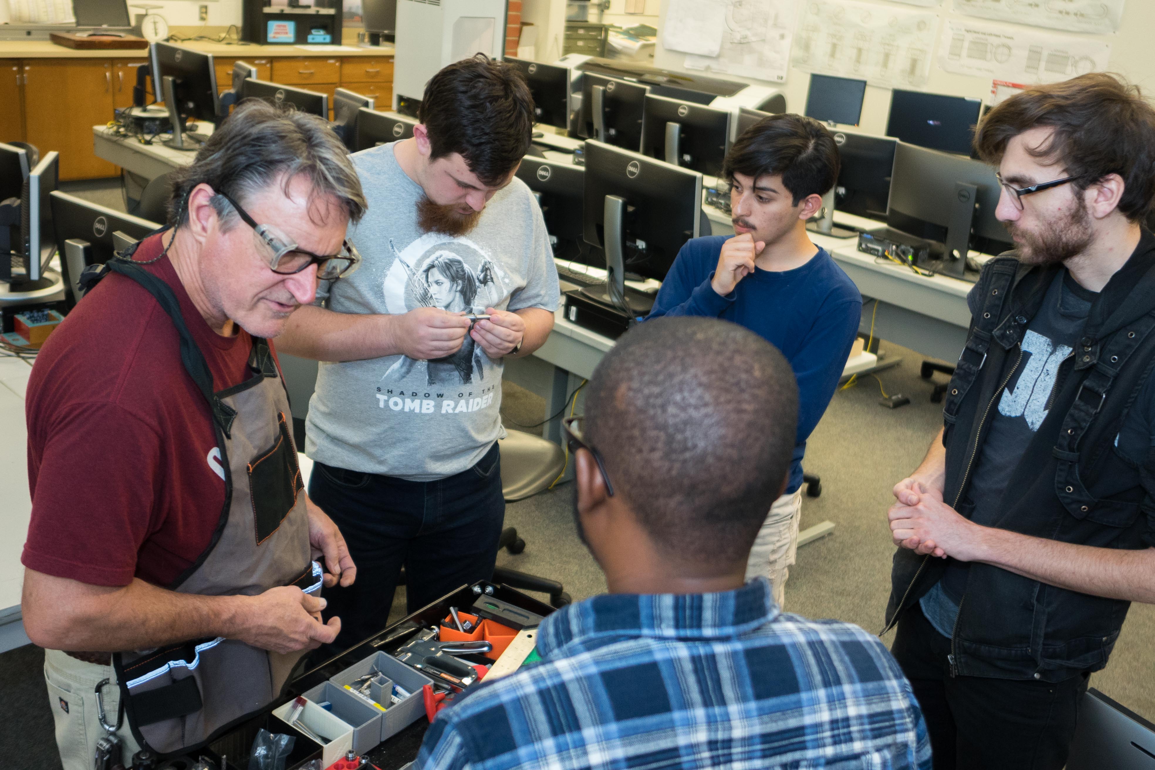 Students receive instruction in a drafting class.