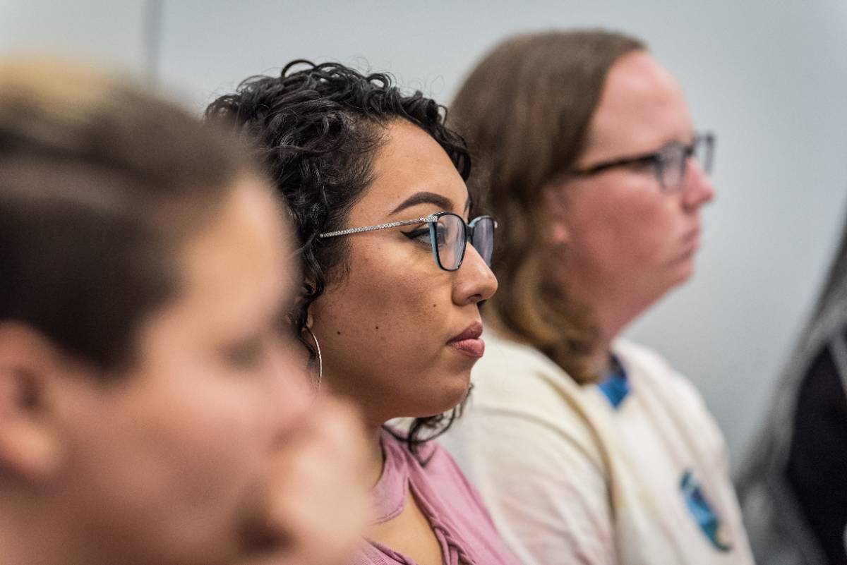 Students attend a class lecture.