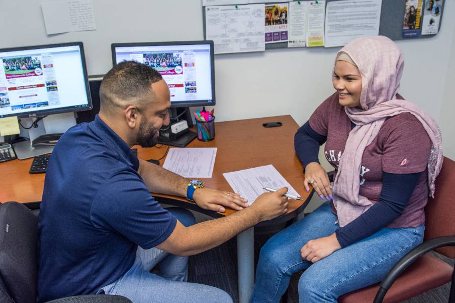 A student meets with a counselor at Chaffey College.