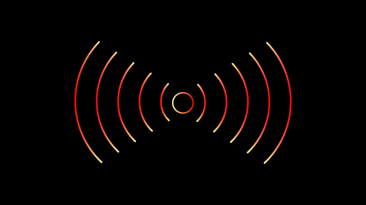 A glowing red and orange wireless signal icon on a black background