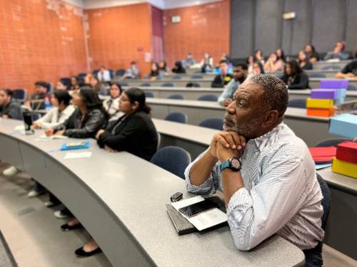 BBMM attendees observe a presentation by alumna Meagan Tandy.