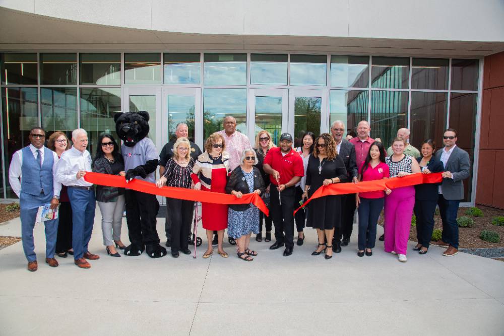 Guests cut the ribbon at the Chino Instructional Building grand opening