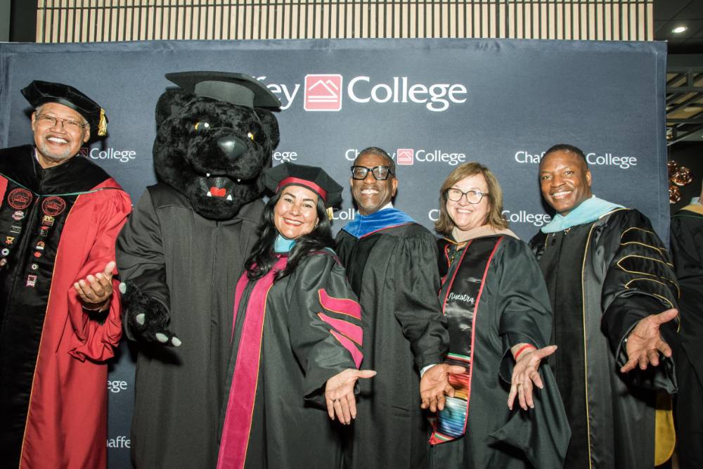 Henry Shannon poses with the leadership team at Commencement