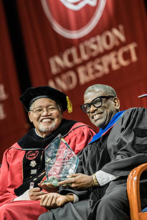 Commencement 2026 3 Dr. Henry Shannon sits with keynote speaker Dr. Daniel Walker at Chaffey's 2026 commencement.