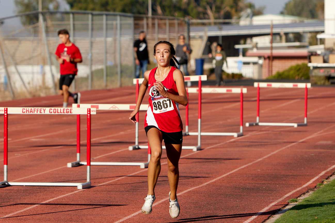 Brianna King competes in cross country