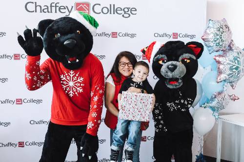 A family at the Chaffey gift drive celebration