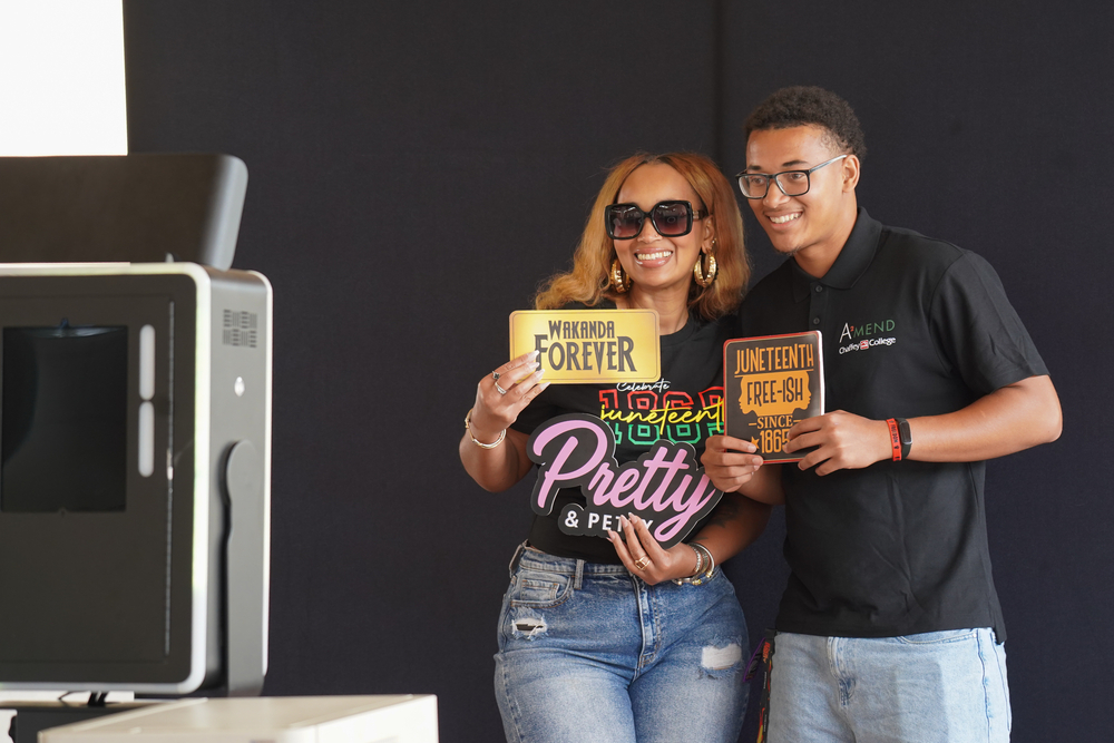CCSG President Dylan Hollie takes a photo with his mother at the Chaffey Juneteenth Celebration.