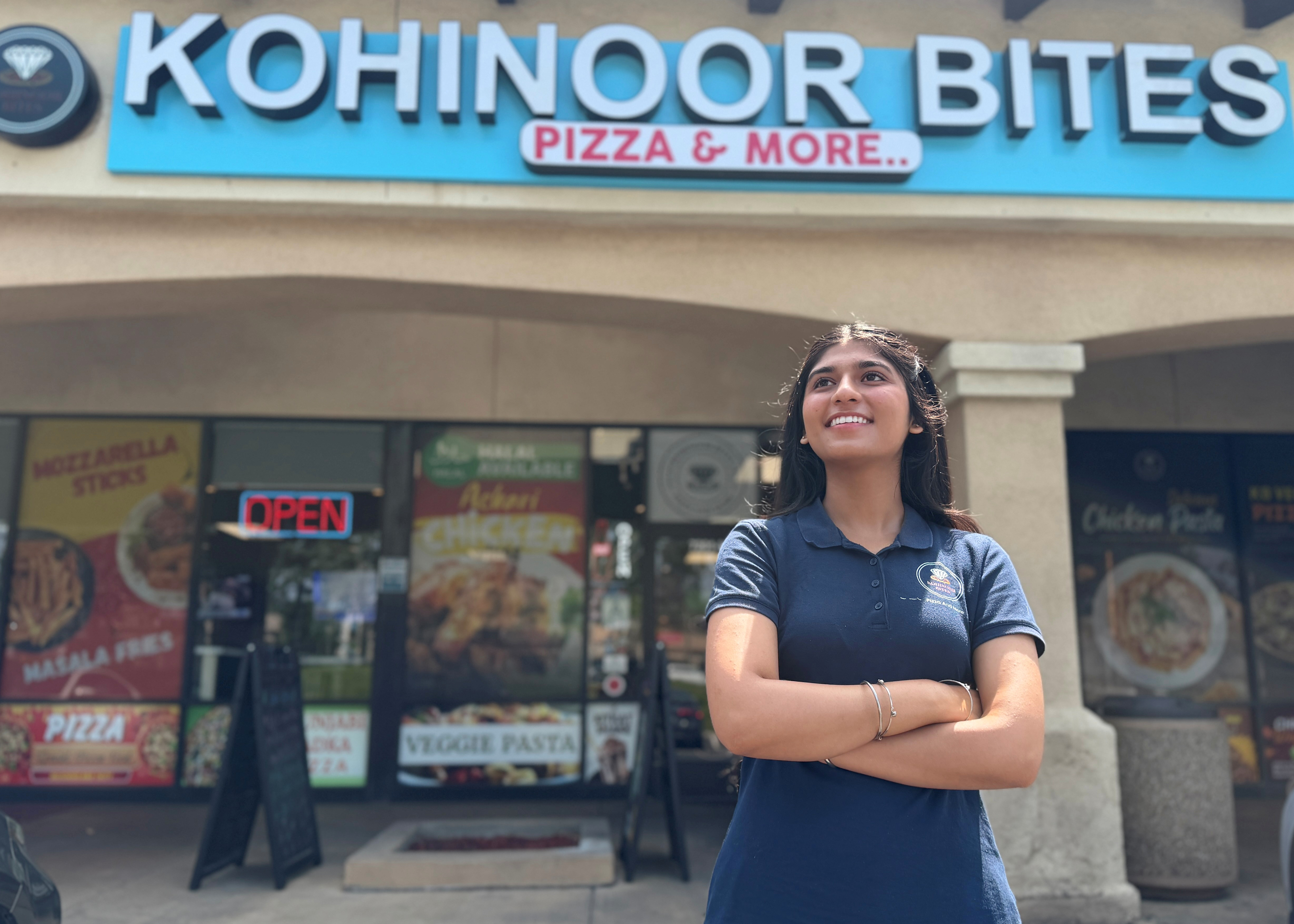 Chaffey student Jasleen Kaur poses in front of her family's business Kohinoor Bites in Rancho Cucamonga