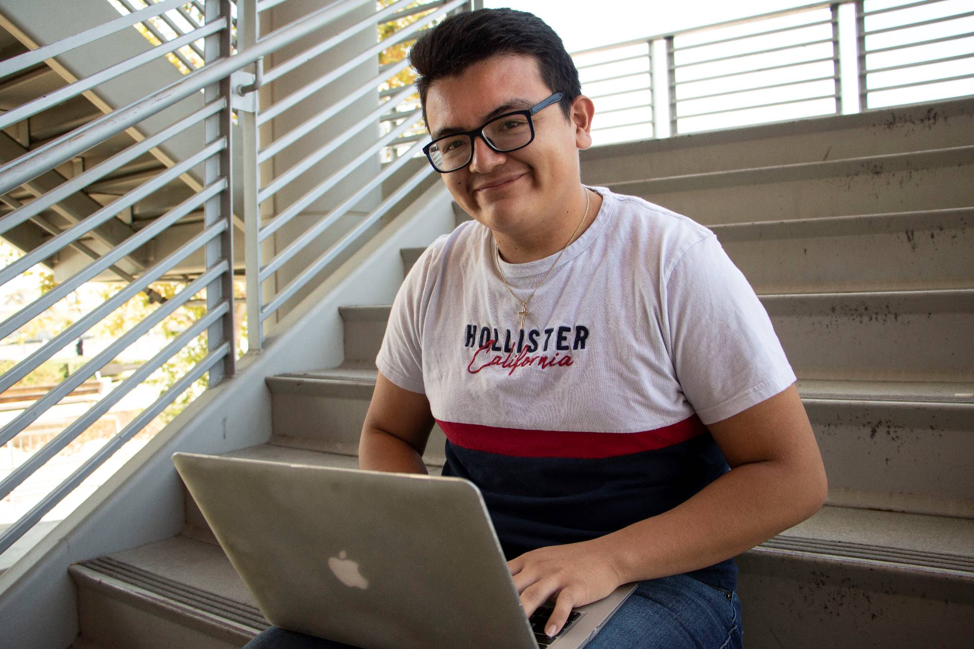 A student works on a laptop at the Fontana campus.