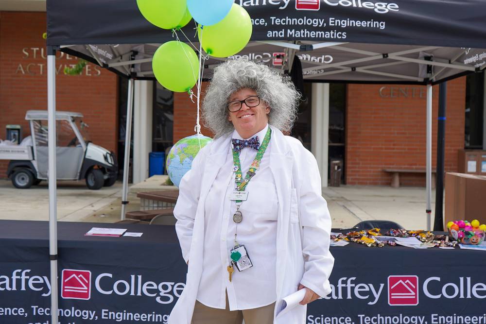 Lisa Pitts poses in a mad scientist costume