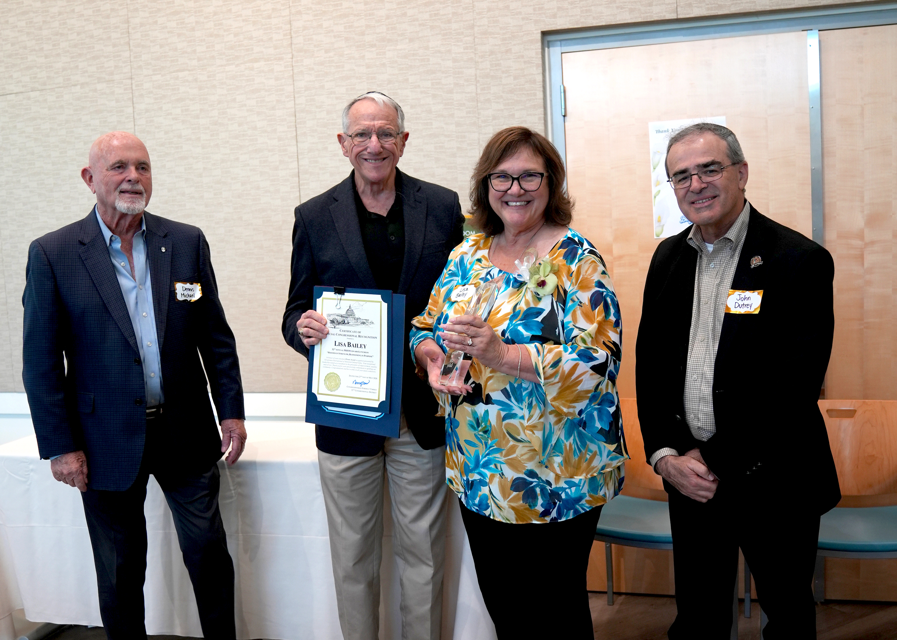 Soroptimist International Awards Lisa Bailey poses with her award at a Soroptimist International awards ceremony.