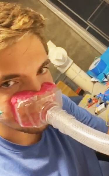 Brayden Diver tests his ventilator mask.
