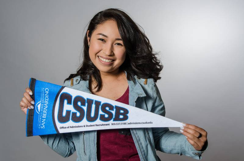 girl holding transfer banner