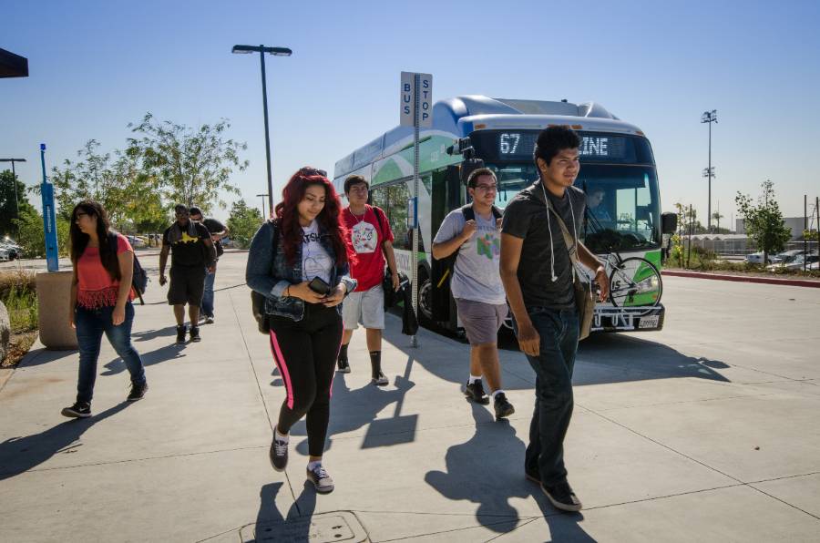 Students exit an Omnitrans bus at Chaffey College.